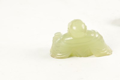 Lot 146 - A CHINESE CARVED JADE SCULPTURE OF A SEATED BUDDHA