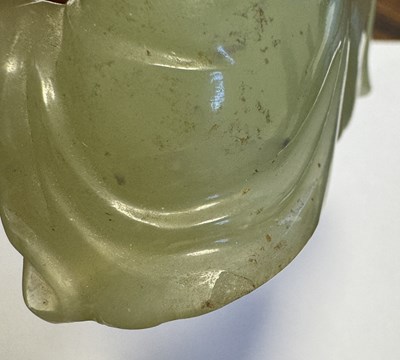 Lot 146 - A CHINESE CARVED JADE SCULPTURE OF A SEATED BUDDHA