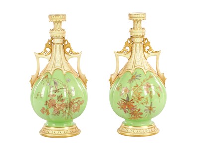 Lot 50 - A FINE AND UNUSUAL PAIR OF ROYAL WORCESTER CABINET VASES