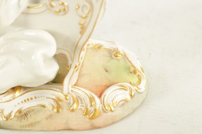 Lot 106 - A 19TH CENTURY MEISSEN CRADLE AND CHERUB FIGURE