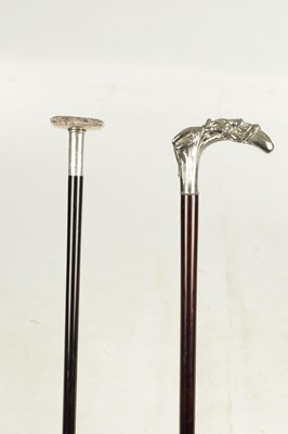 Lot 505 - A LATE 19TH CENTURY SILVER CUSHION TOPPED WALKING STICK TOGETHER WITH A SILVER PLATED ART NOVEAU STYLE STICK WITH A NUDE FEMALE LAYING IN BULL RUSHES