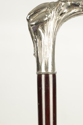 Lot 505 - A LATE 19TH CENTURY SILVER CUSHION TOPPED WALKING STICK TOGETHER WITH A SILVER PLATED ART NOVEAU STYLE STICK WITH A NUDE FEMALE LAYING IN BULL RUSHES