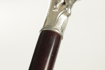 Lot 505 - A LATE 19TH CENTURY SILVER CUSHION TOPPED WALKING STICK TOGETHER WITH A SILVER PLATED ART NOVEAU STYLE STICK WITH A NUDE FEMALE LAYING IN BULL RUSHES