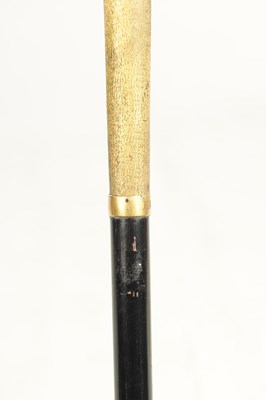 Lot 494 - A LATE 19TH CENTURY GILT METAL SWAN'S HEAD WALKING STICK