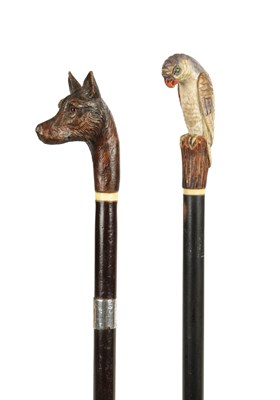 Lot 501 - TWO LATE 19TH CENTURY CARVED WOOD WALKING STICKS