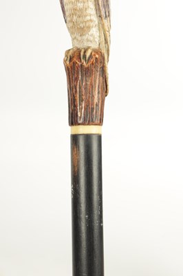 Lot 501 - TWO LATE 19TH CENTURY CARVED WOOD WALKING STICKS