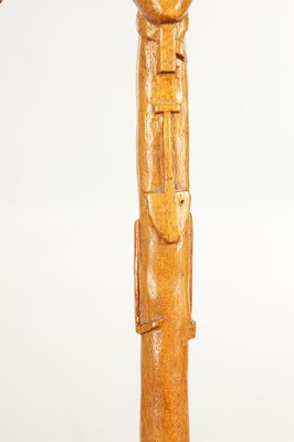 Lot 496 - A COLLECTION OF THREE LATE 19TH CENTURY CARVED WOOD MASK HEAD WALKING STICKS