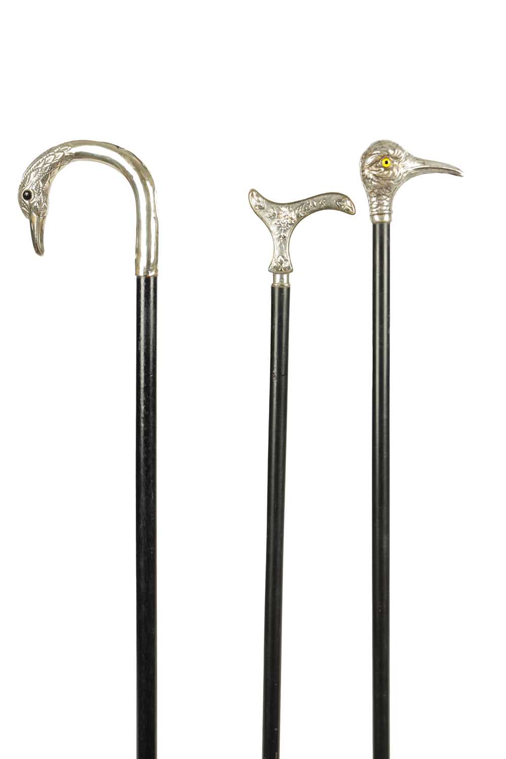 Lot 498 - A COLLECTION OF THREE FRENCH SILVER AND SILVER PLATE LADIES WALKING STICKS