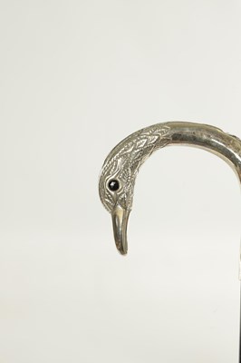 Lot 498 - A COLLECTION OF THREE FRENCH SILVER AND SILVER PLATE LADIES WALKING STICKS