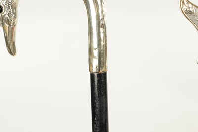 Lot 498 - A COLLECTION OF THREE FRENCH SILVER AND SILVER PLATE LADIES WALKING STICKS