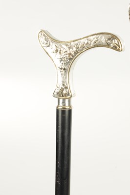 Lot 498 - A COLLECTION OF THREE FRENCH SILVER AND SILVER PLATE LADIES WALKING STICKS
