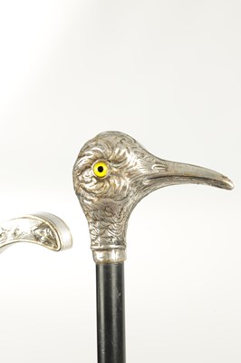 Lot 498 - A COLLECTION OF THREE FRENCH SILVER AND SILVER PLATE LADIES WALKING STICKS
