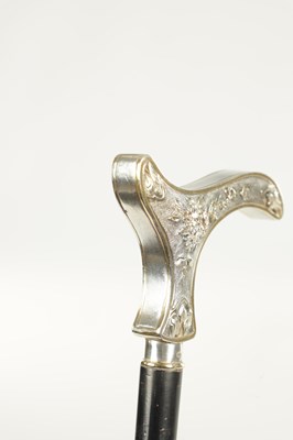 Lot 498 - A COLLECTION OF THREE FRENCH SILVER AND SILVER PLATE LADIES WALKING STICKS