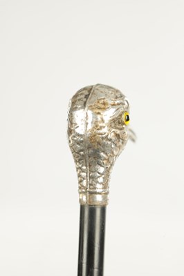 Lot 498 - A COLLECTION OF THREE FRENCH SILVER AND SILVER PLATE LADIES WALKING STICKS