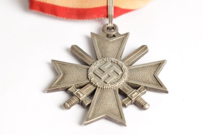 Lot 538 - A GERMAN WW2 SILVER KNIGHT'S CROSS OF THE WAR - MERIT CROSS WITH SWORDS