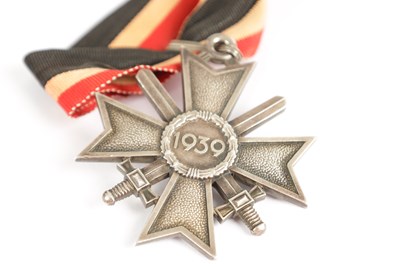 Lot 538 - A GERMAN WW2 SILVER KNIGHT'S CROSS OF THE WAR - MERIT CROSS WITH SWORDS