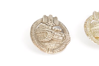 Lot 548 - A COLLECTION OF THREE WW2 GERMAN THIRD REICH SILVER AND SILVER METAL PANZER ASSAULT BADGES