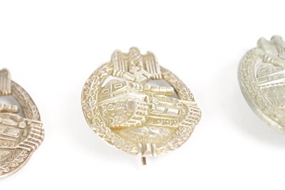 Lot 548 - A COLLECTION OF THREE WW2 GERMAN THIRD REICH SILVER AND SILVER METAL PANZER ASSAULT BADGES