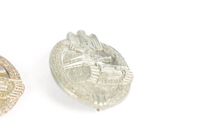 Lot 548 - A COLLECTION OF THREE WW2 GERMAN THIRD REICH SILVER AND SILVER METAL PANZER ASSAULT BADGES