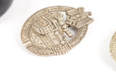 Lot 548 - A COLLECTION OF THREE WW2 GERMAN THIRD REICH SILVER AND SILVER METAL PANZER ASSAULT BADGES