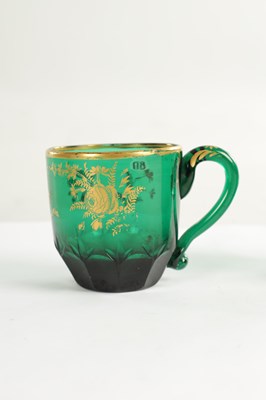 Lot 10 - A PAIR OF LATE GEORGIAN BRISTOL GREEN GLASS CUPS IN THE MANNER OF JAMES GILES