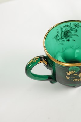 Lot 10 - A PAIR OF LATE GEORGIAN BRISTOL GREEN GLASS CUPS IN THE MANNER OF JAMES GILES