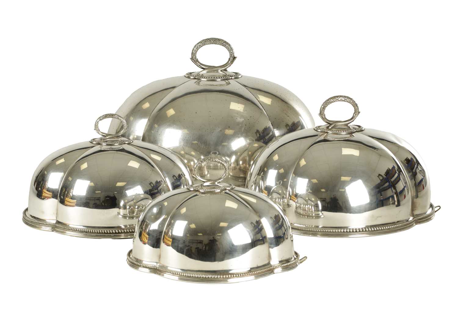 Lot 468 - A GRADUATED SET OF FOUR 19TH CENTURY ELKINGTON PLATE MEAT COVERS
