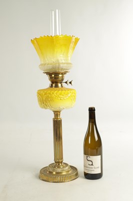 Lot 713 - A FINE VICTORIAN BRASS AND YELLOW GLASS OIL LAMP