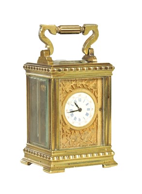 Lot 1111 - A LATE 19TH CENTURY FRENCH BRASS CARRIAGE CLOCK OF TINY PROPORTIONS