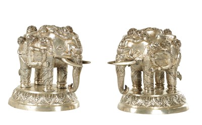 Lot 222 - A PAIR OF LATE 19TH CENTURY INDIAN SILVER SCULPTURES OF ELEPHANTS