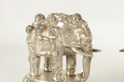 Lot 222 - A PAIR OF LATE 19TH CENTURY INDIAN SILVER SCULPTURES OF ELEPHANTS