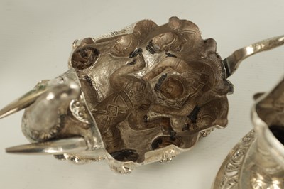 Lot 222 - A PAIR OF LATE 19TH CENTURY INDIAN SILVER SCULPTURES OF ELEPHANTS