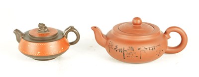 Lot 150 - TWO CHINESE TERRACOTTA TEAPOTS