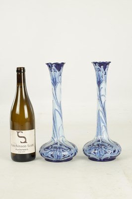 Lot 46 - A PAIR OF LATE 19TH CENTURY MOORCROFT FLORIAN WARE CABINET VASES