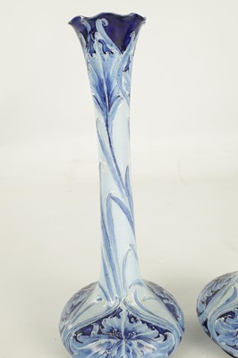 Lot 46 - A PAIR OF LATE 19TH CENTURY MOORCROFT FLORIAN WARE CABINET VASES