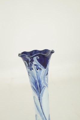 Lot 46 - A PAIR OF LATE 19TH CENTURY MOORCROFT FLORIAN WARE CABINET VASES