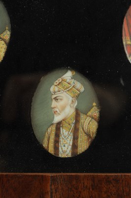 Lot 295 - A FRAMED COLLECTION OF 19TH CENTURY INDIAN PORTRAIT MINIATURES ON IVORY