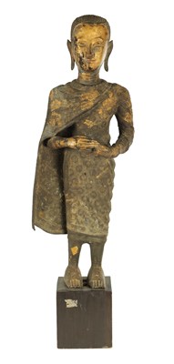 Lot 168 - AN EARLY GILT BRONZE BURMESE STANDING BUDDHA