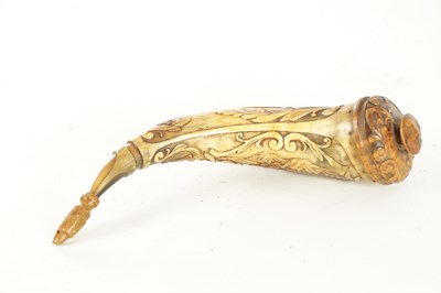 Lot 556 - AN UNUSUAL 19TH CENTURY AMERICAN CARVED HORN POWDER FLASK
