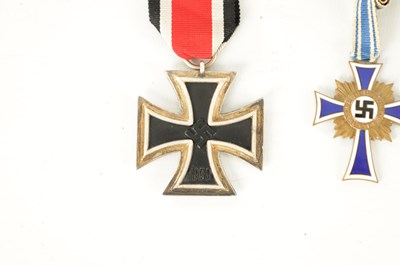 Lot 547 - THREE WWII GERMAN NAZI MEDALS AND AN EMBROIDERED INSIGNIA