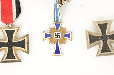 Lot 547 - THREE WWII GERMAN NAZI MEDALS AND AN EMBROIDERED INSIGNIA