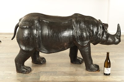 Lot 628 - A LARGE LIBERTY STYLE LEATHER BOUND MODEL OF A RHINO