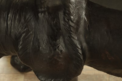 Lot 628 - A LARGE LIBERTY STYLE LEATHER BOUND MODEL OF A RHINO