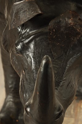 Lot 628 - A LARGE LIBERTY STYLE LEATHER BOUND MODEL OF A RHINO