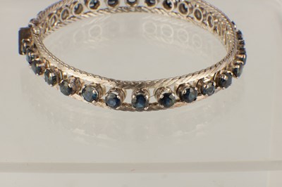 Lot 564 - A LADIES 18CT WHITE GOLD SAPPHIRE BRACELET