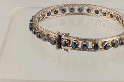 Lot 564 - A LADIES 18CT WHITE GOLD SAPPHIRE BRACELET