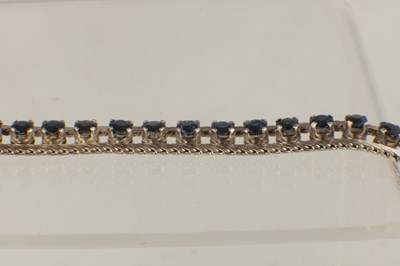 Lot 564 - A LADIES 18CT WHITE GOLD SAPPHIRE BRACELET
