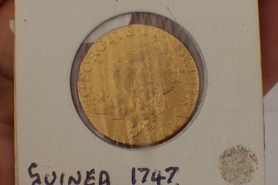 Lot 553 - A GEORGE II 1747 GOLD GUINEA