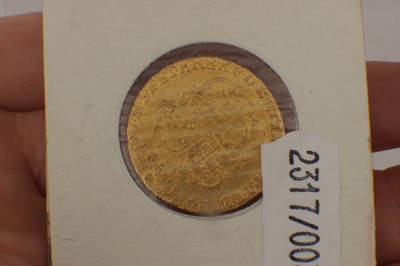 Lot 553 - A GEORGE II 1747 GOLD GUINEA