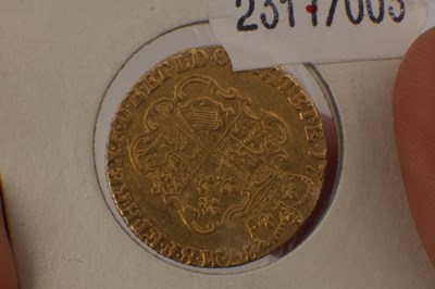 Lot 553 - A GEORGE II 1747 GOLD GUINEA